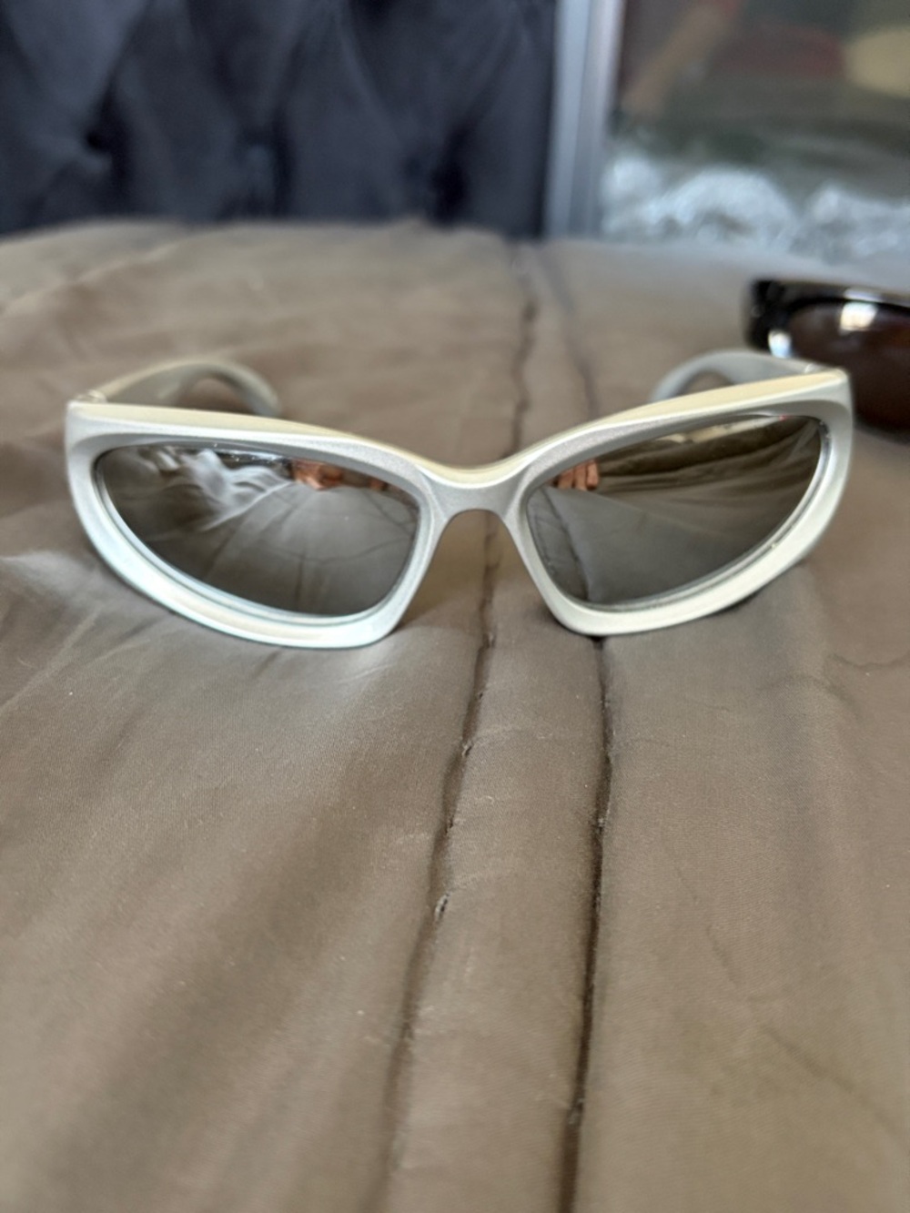 Balenciaga silver swift oval Sunglasses with reflective lenses